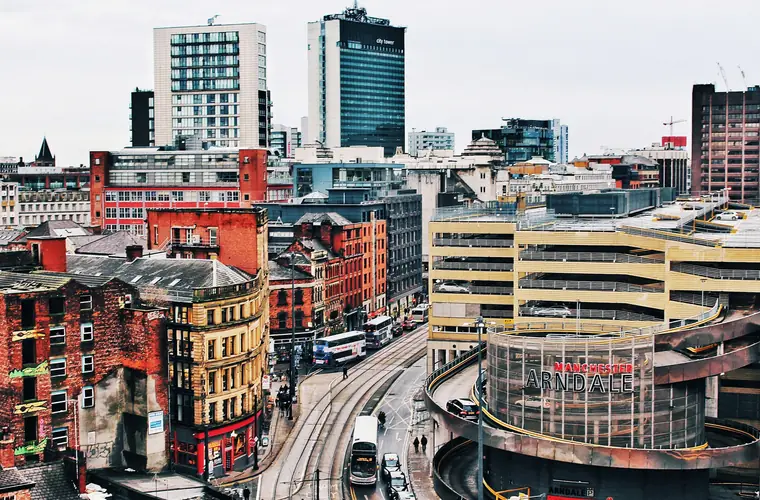 Aerial view of Manchester city centre rooftops — publishing services in Manchester